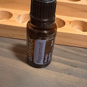 Doterra Peppermint Essential Oil Bottle - Brown and Black